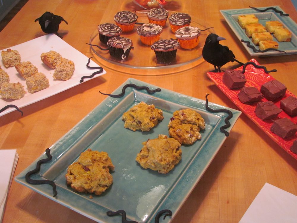 Trunk show treats - Yes, I made them.  From 11 o'clock going clockwise, Pumpkin granola bars, Spider Web Cupcakes, Pumpkin Blondies, Delicious, decadent fudge and Pumpkin Scones